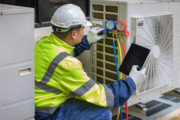 Professional Heat Pump Repair technician working in Key Biscayne, FL